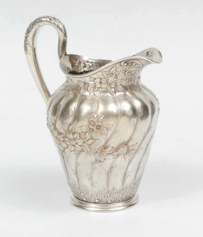 Appraisal: S KIRK SON CO STERLING PITCHER Repousse floral pattern with