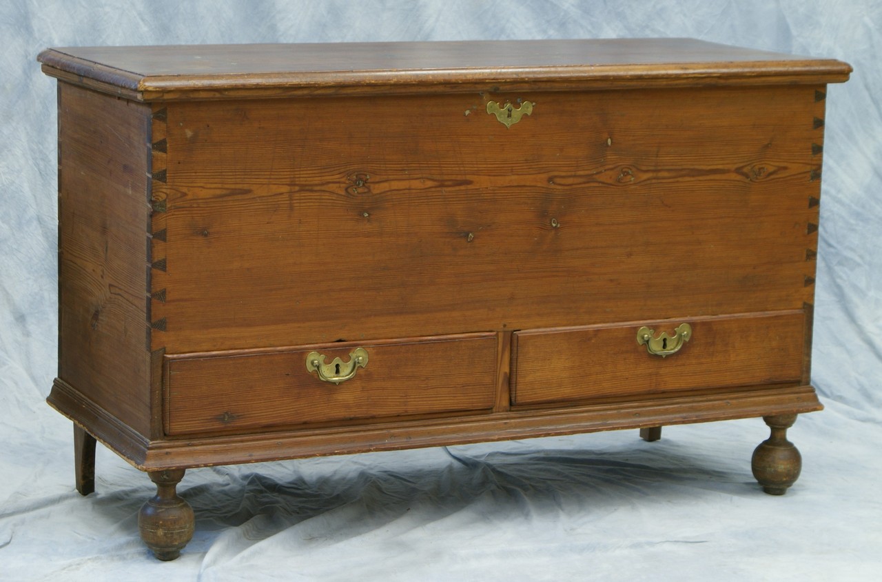 Appraisal: Yellow pine drawer blanket chest with turned ball feet th