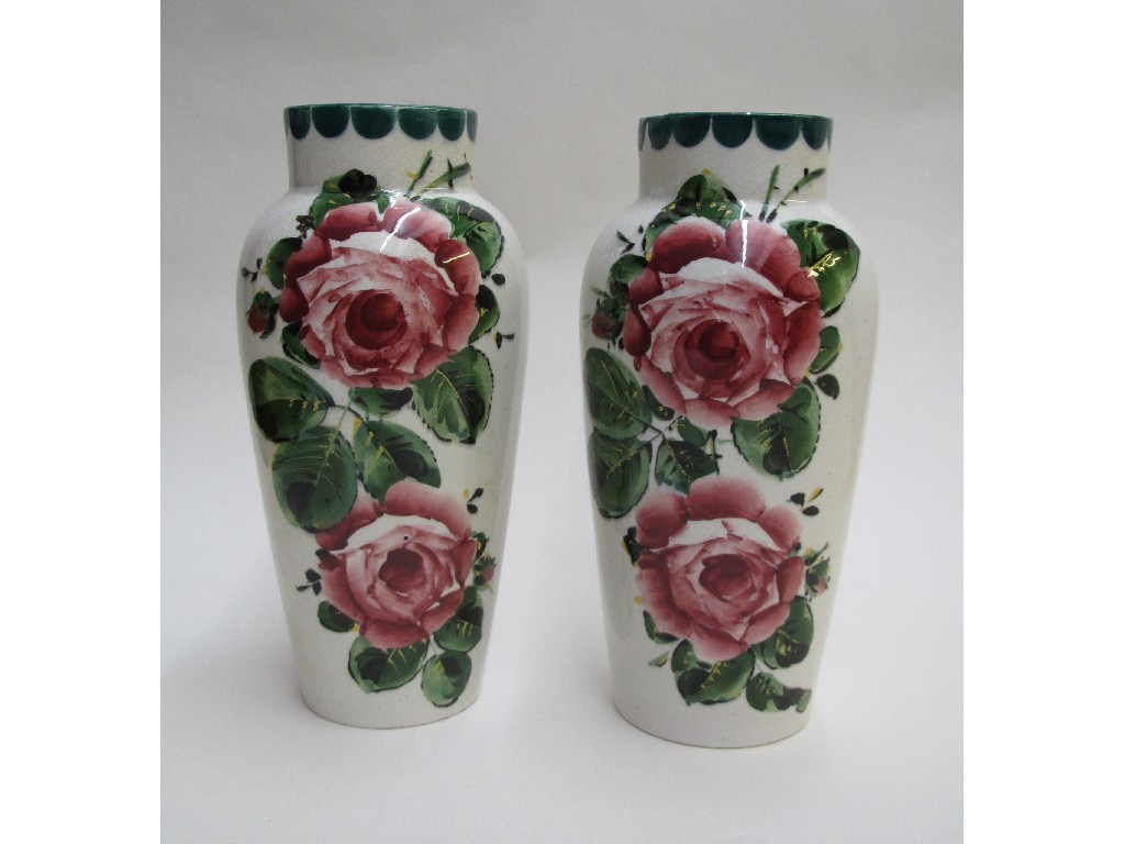 Appraisal: A pair of Wemyss shouldered Japan vases painted with cabbage