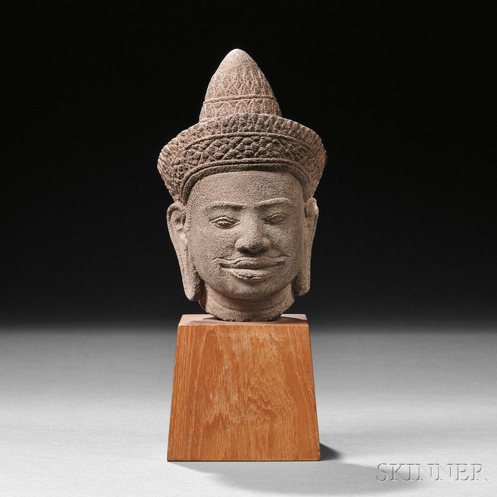 Appraisal: Sandstone Head of a Buddhist Deity Khmer Angkor period-style wearing