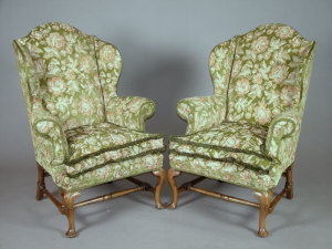 Appraisal: A pair of George II style wingback chairs early th