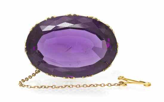 Appraisal: A Victorian Yellow Gold and Amethyst Brooch containing one oval