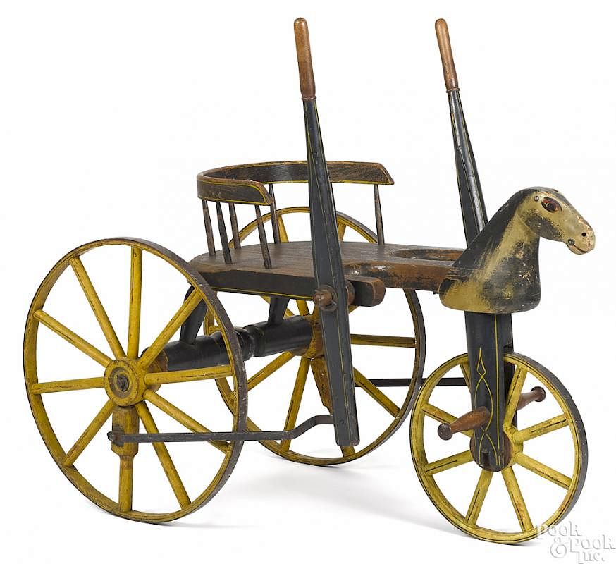 Appraisal: Hand propelled carved and painted horse velocipede Hand propelled carved