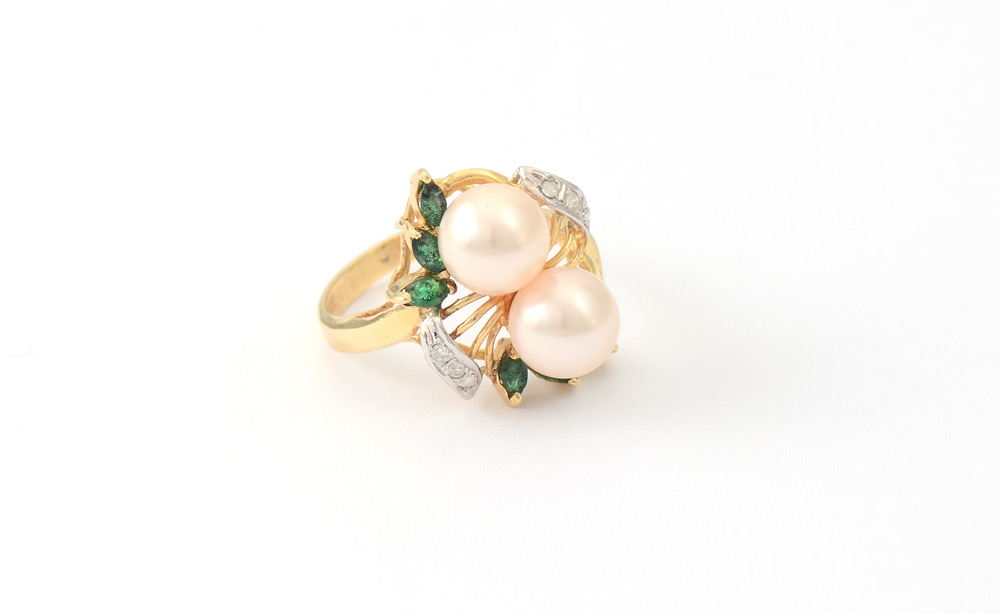 Appraisal: EMERALD PEARL DIAMOND RING K yellow gold emerald and diamond