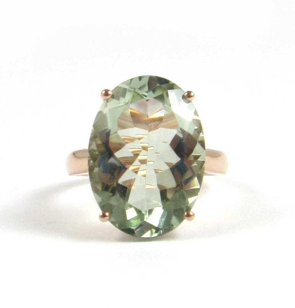 Appraisal: LIGHT BLUE GREEN PRASIOLITE SOLITAIRE RING Oval-cut prasiolite cts K