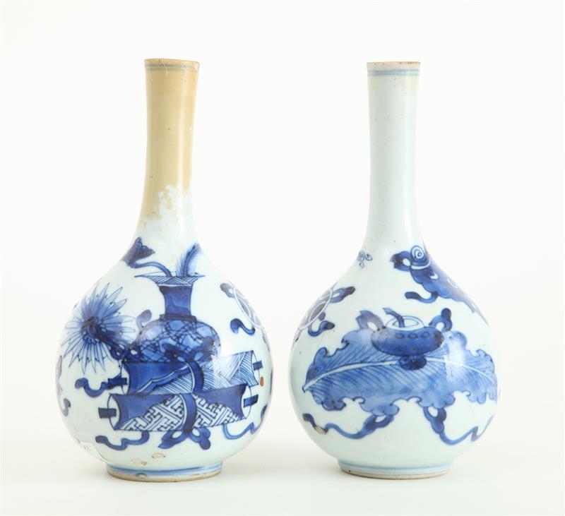 Appraisal: PAIR OF K'ANG HSI BLUE AND WHITE PORCELAIN BOTTLE-FORM VASES