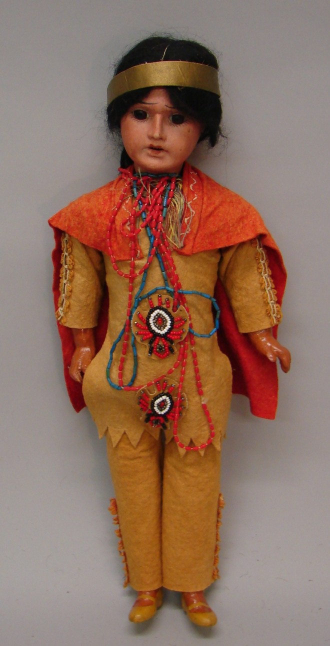 Appraisal: German bisque Native American character doll Stationary brown eyes open