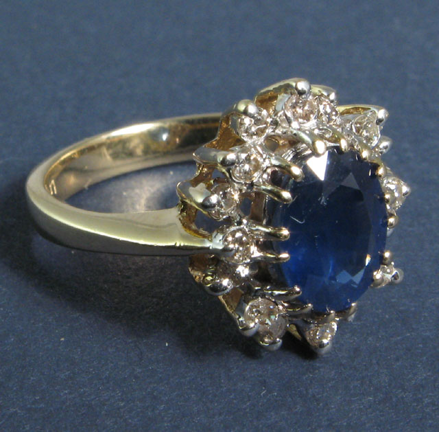 Appraisal: SAPPHIRE DIAMOND AND YELLOW GOLD RING The k yellow gold