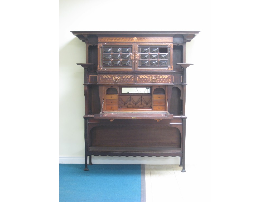 Appraisal: An Arts and Crafts mahogany Cabinet having floral marquetry inlay