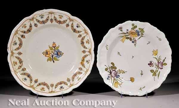 Appraisal: Two French Faience Floral-Decorated Plates th c one probably Montpellier