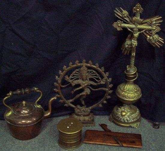 Appraisal: An embossed brass crucifix a copper kettle and three other