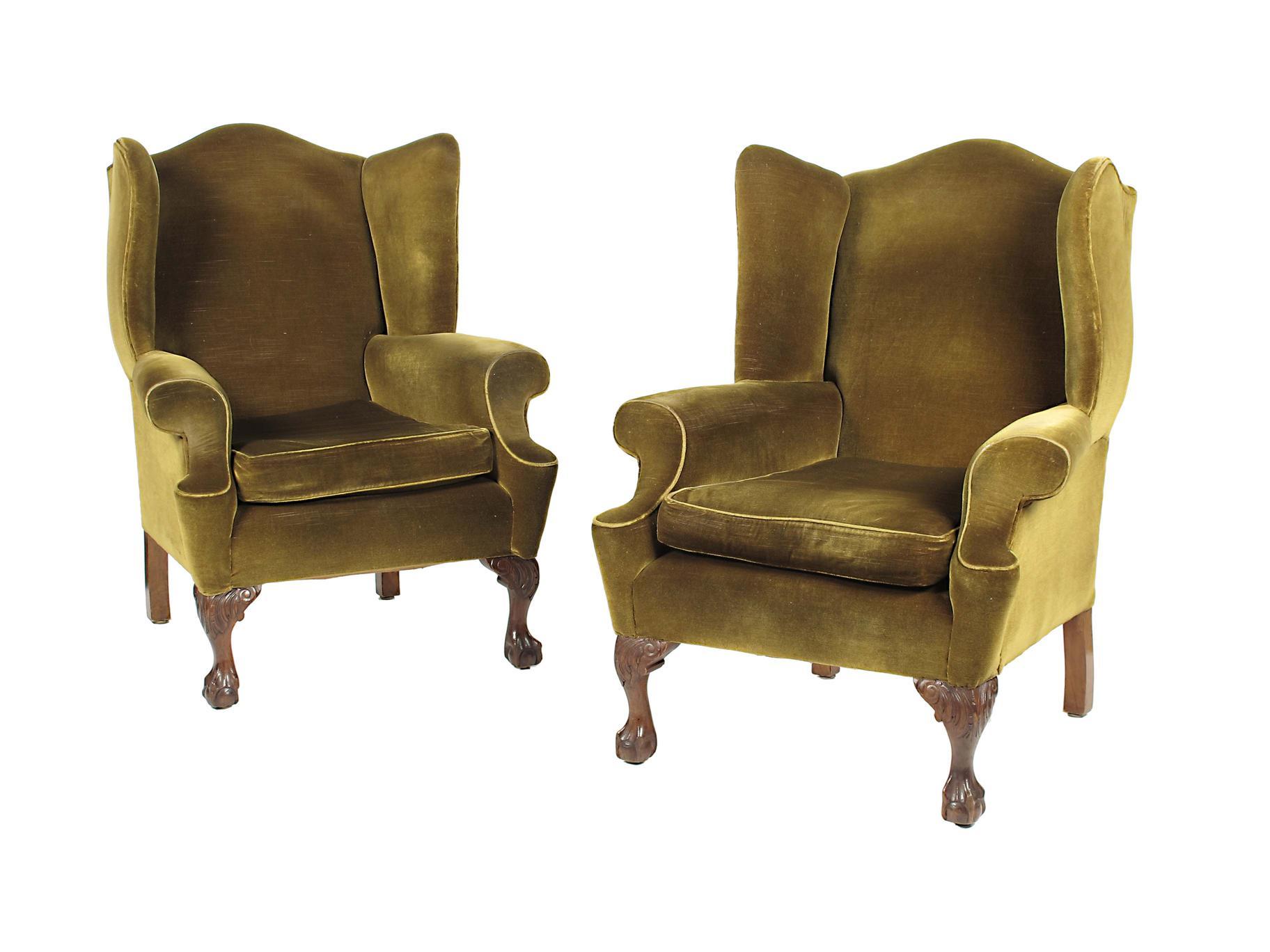 Appraisal: A pair walnut of wing armchairs in th century style