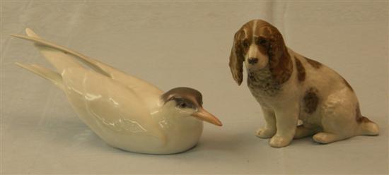 Appraisal: Two Royal Copenhagen figures comprising a seated spaniel high and