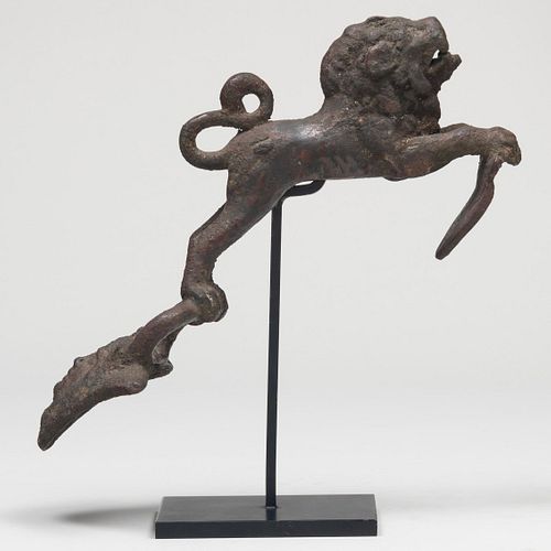 Appraisal: ANCIENT ROMAN STYLE CAST-BRONZE LEAPING LION FORM FURNITURE MOUNTRaised on