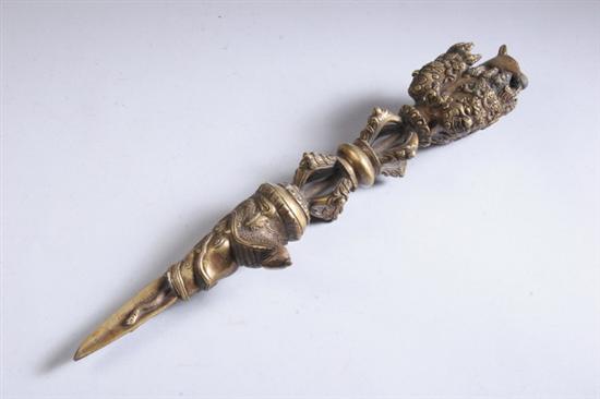 Appraisal: TIBETAN BRASS RITUAL DAGGER PHUR-BU With tripartite triangular blade openwork