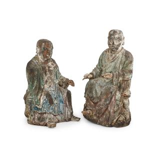 Appraisal: PAIR OF KOREAN CHOSON WOOD CARVED FIGURES Seated polychrome painted