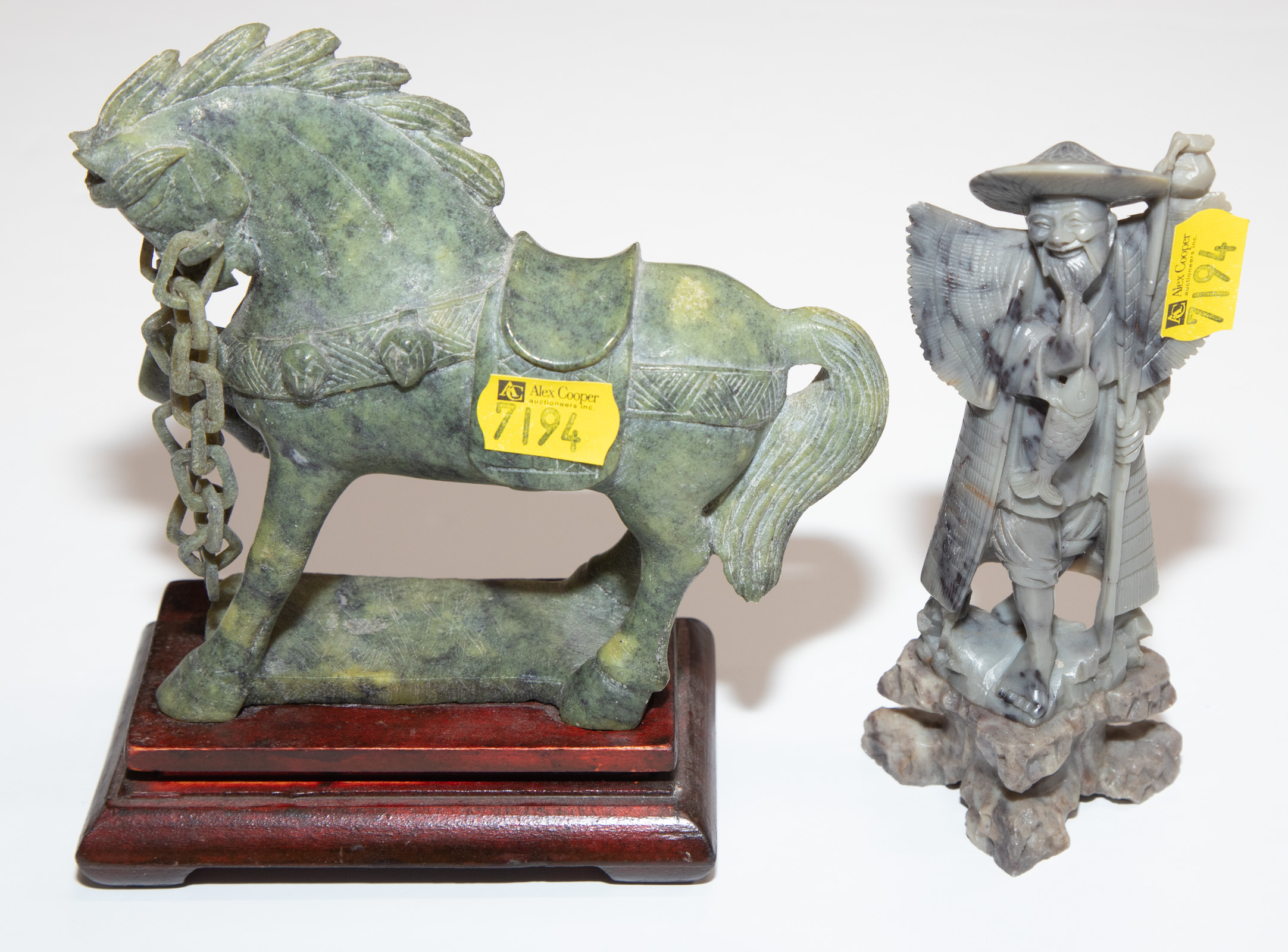 Appraisal: TWO CHINESE CARVED SOAPSTONE ARTICLES Includes a fisherman in H