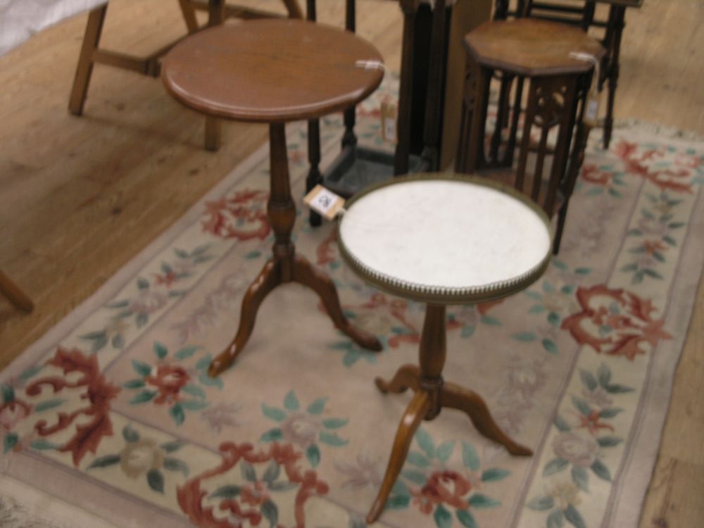 Appraisal: An oak wine table on beech stem and tripod base