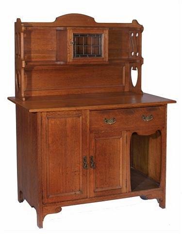 Appraisal: A LATE VICTORIAN SMALL OAK DRESSER IN ARTS AND CRAFT