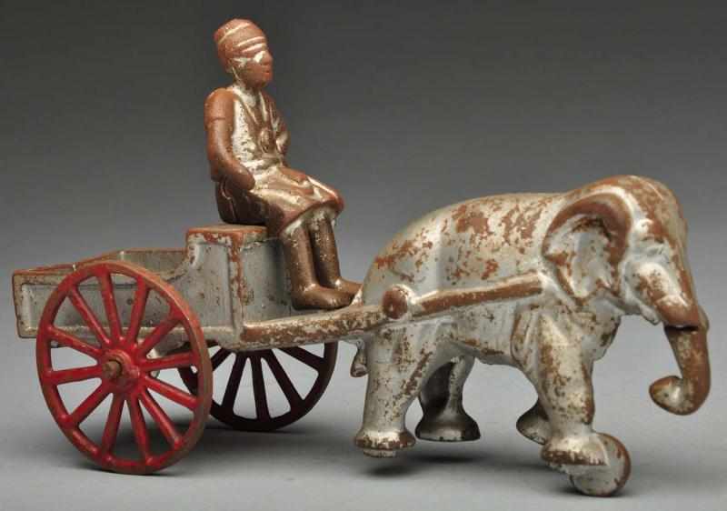 Appraisal: Cast Iron Kenton Hindu Cart Elephant-Drawn Toy Description American Original