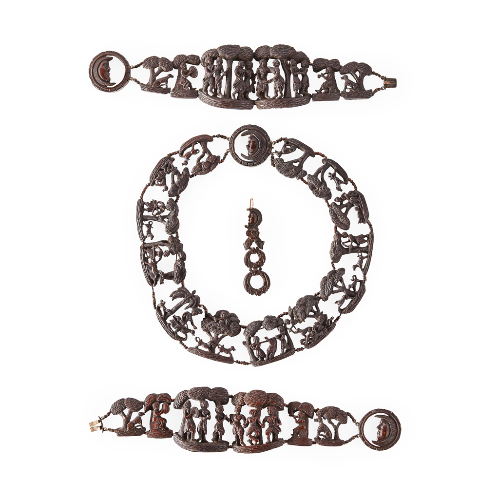 Appraisal: A th century part suite of carved horn jewellery comprising