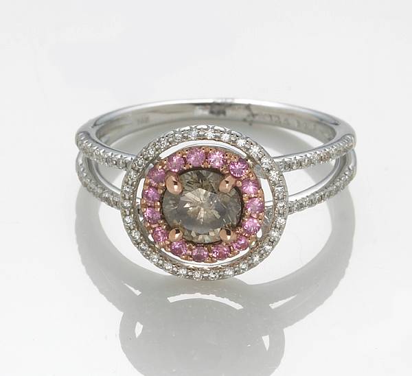 Appraisal: A pink sapphire colored diamond diamond and k white gold