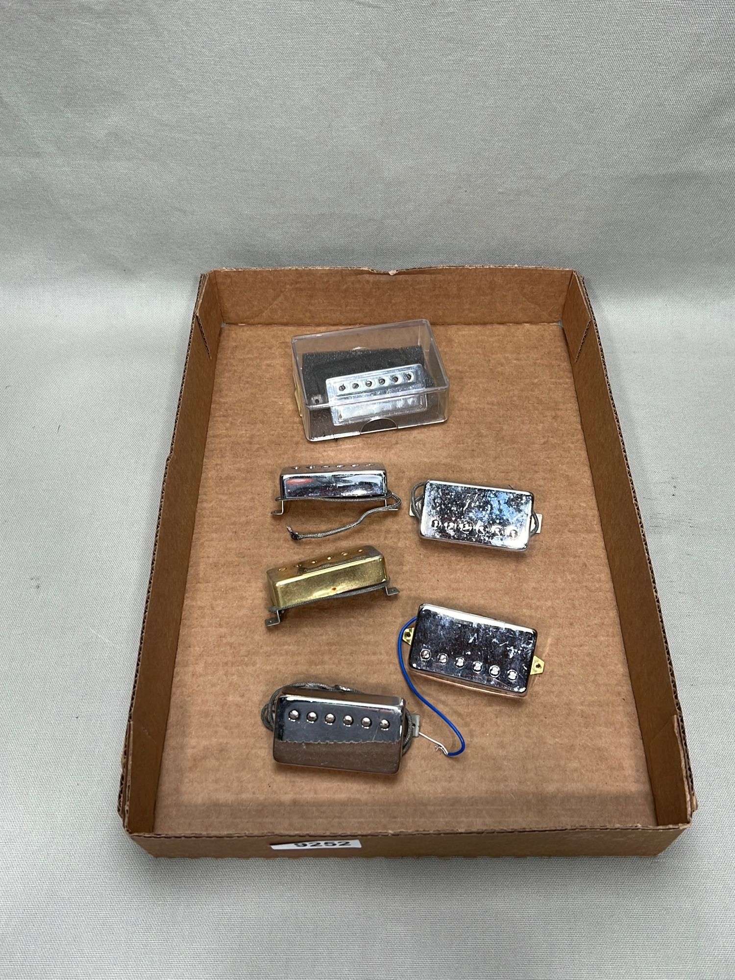 Appraisal: Lot of vintage potted humbucker pickupsLot of vintage potted humbucker