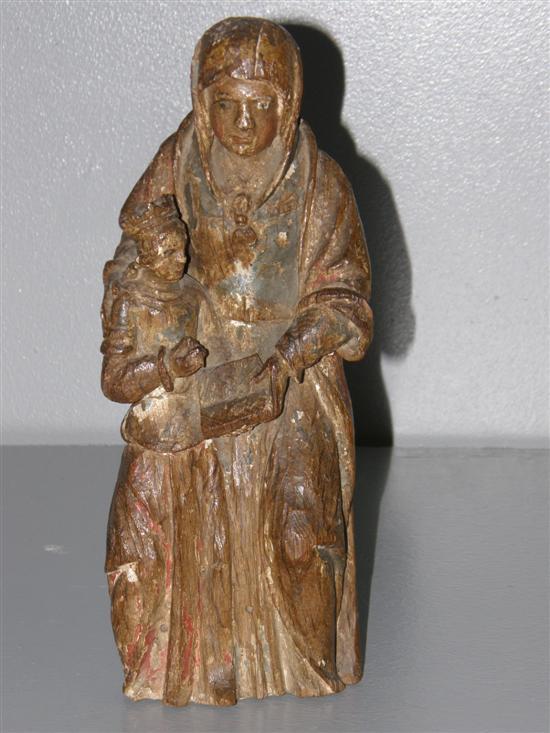 Appraisal: Carved oak group of the Virgin as protector Flemish or