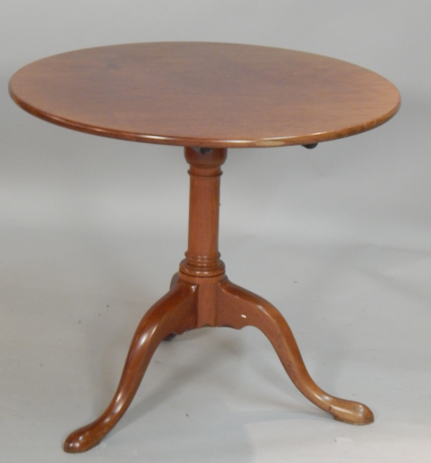 Appraisal: A George III mahogany occasional table the circular tilt top