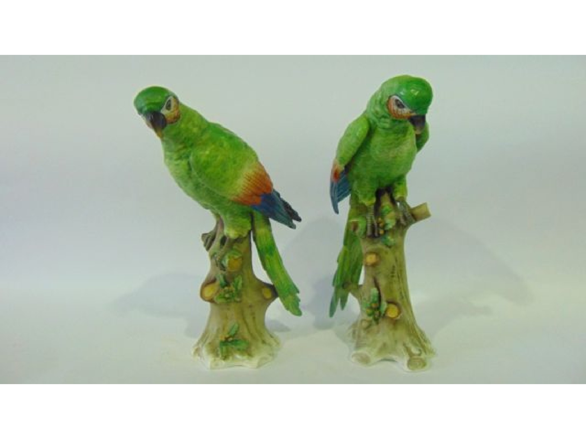 Appraisal: A pair of th century continental models of green parrots