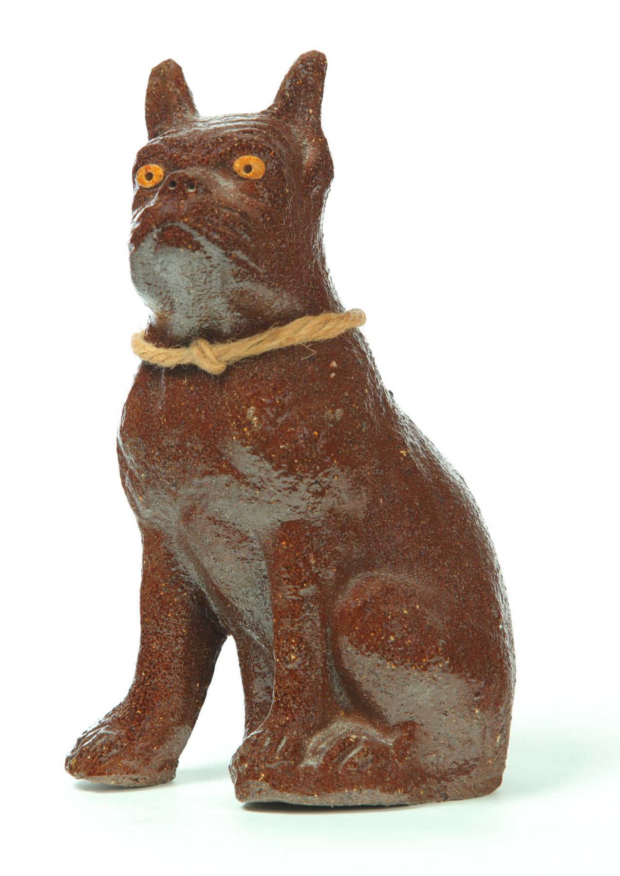 Appraisal: SEWERTILE DOG Probably Ohio Seated boxer with light brown glazed