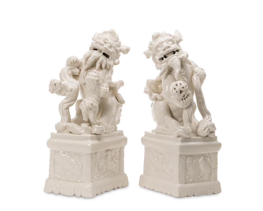 Appraisal: A PAIR OF PORCELAIN BLANC DE CHINE GUARDIAN LIONSA pair