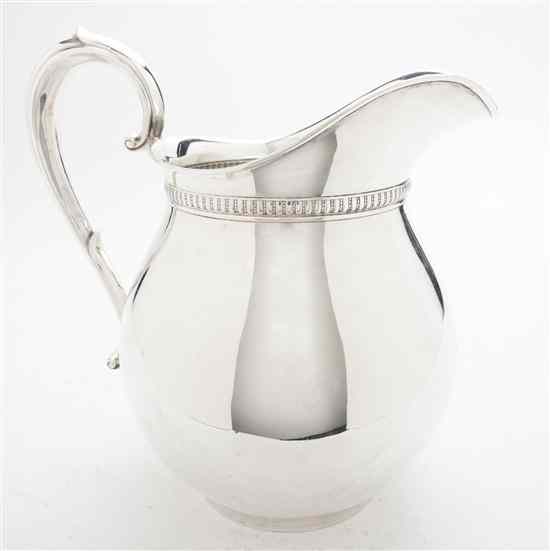 Appraisal: An American Sterling Silver Pitcher Wallace of ovoid form with