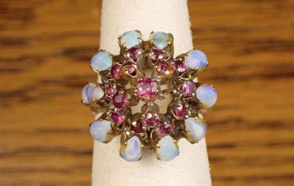 Appraisal: OPAL RUBY AND FOURTEEN KARAT GOLD RING The k yellow