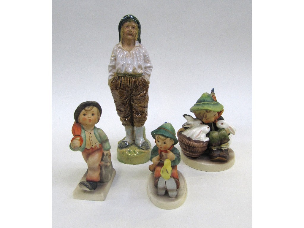 Appraisal: Three Hummel figures 'Playmates' TMK 'Singing Lesson' TMK and 'Merry