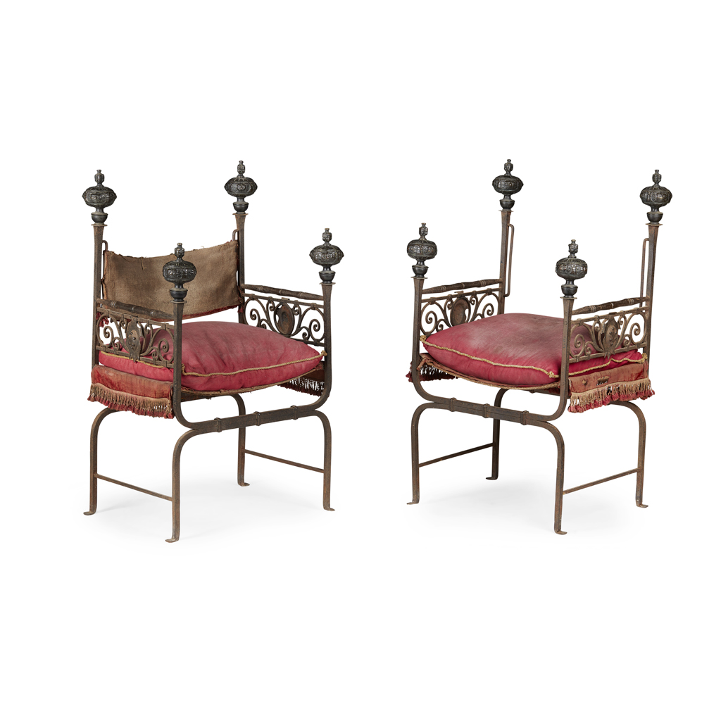 Appraisal: PAIR OF ITALIAN BAROQUE IRON AND BRASS CURULE ARMCHAIRS TH