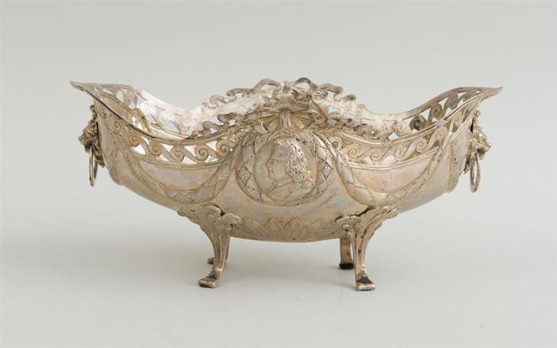 Appraisal: CONTINENTAL REPOUSS SILVER SMALL CENTERPIECE With three rubbed punch marks