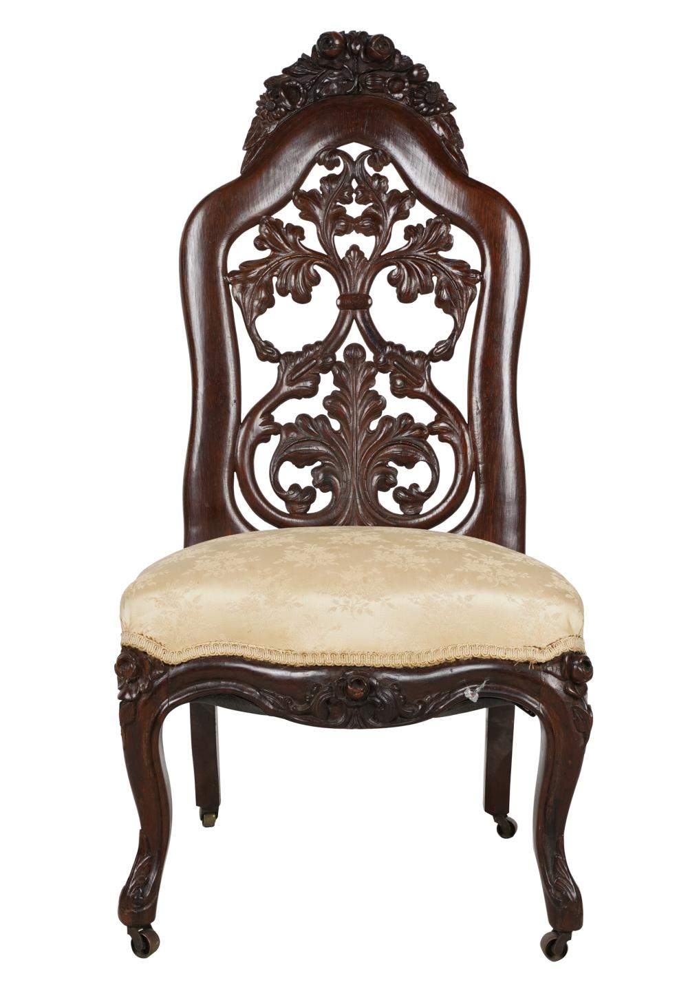 Appraisal: VICTORIAN CARVED MAHOGANY LOW CHAIRwith pierced chair back over a