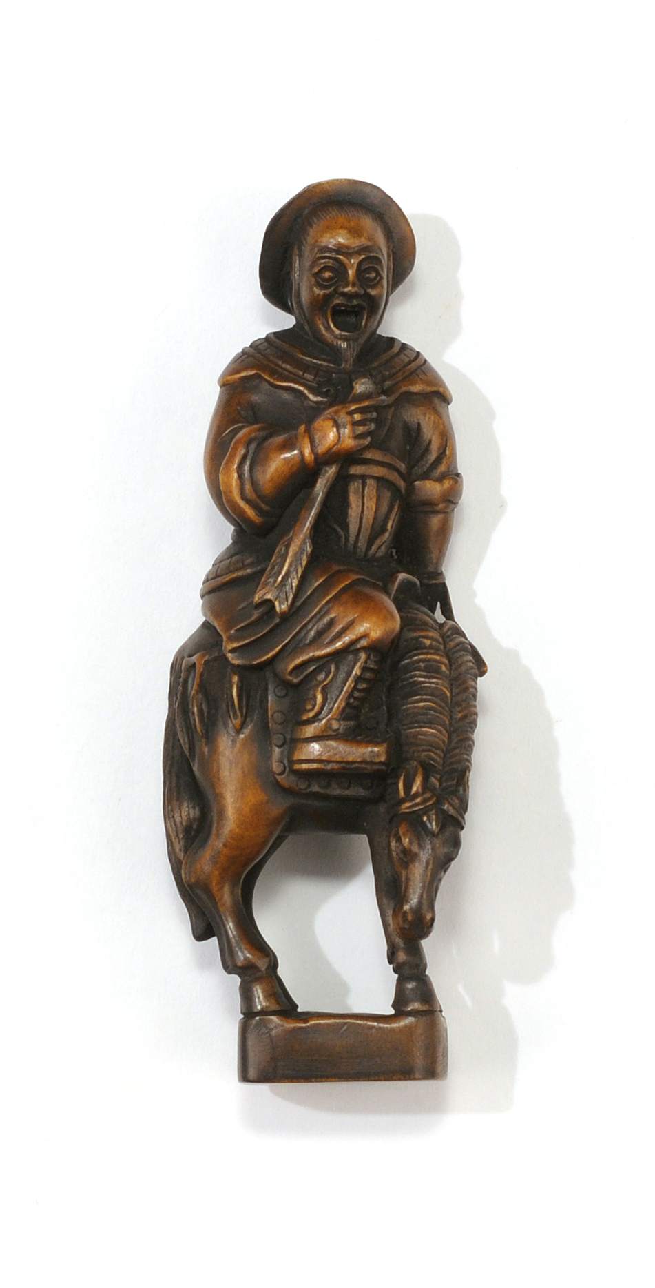 Appraisal: WOOD NETSUKE th CenturyIn the form of a Mongolian archer