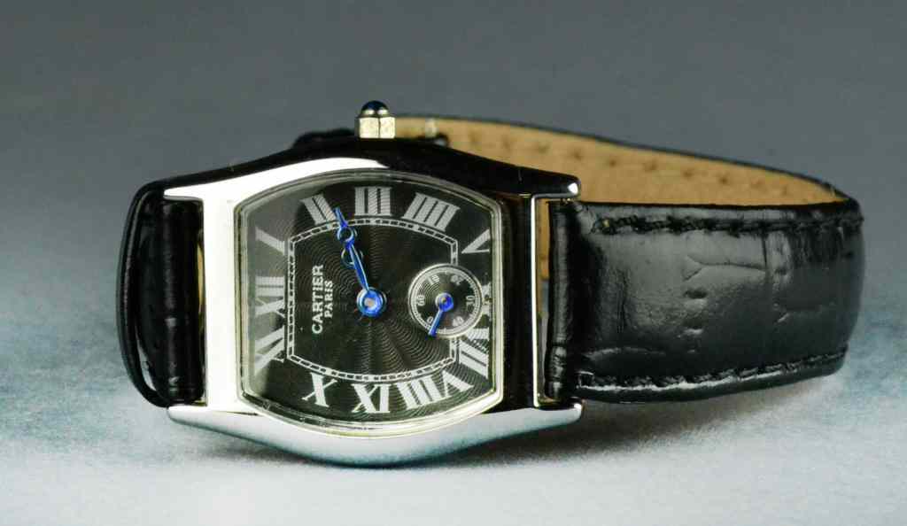 Appraisal: Ladies Cartier WristwatchSwiss made black face with Roman numerals electric