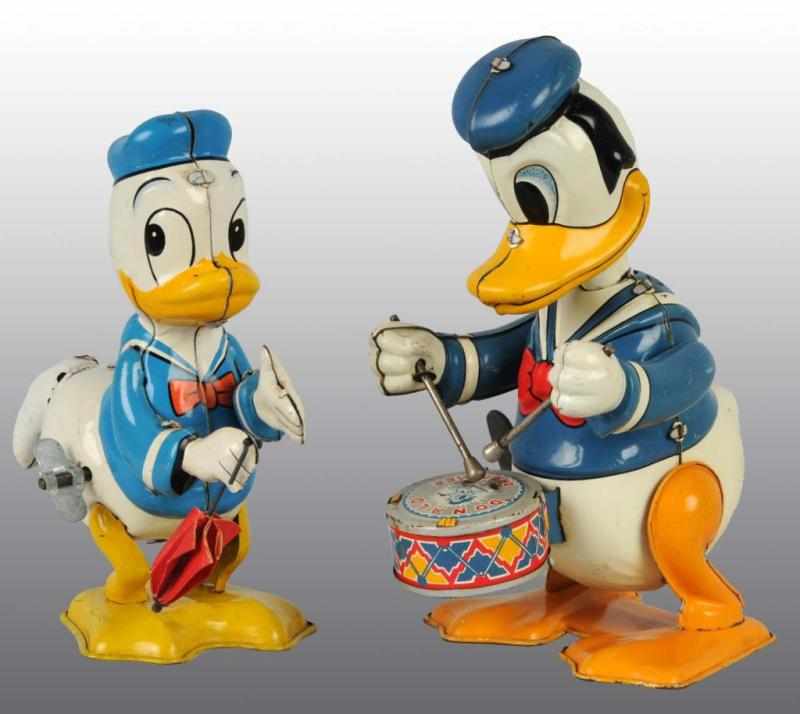 Appraisal: Lot of Tin Linemar Disney Donald Duck Toys Description Japanese