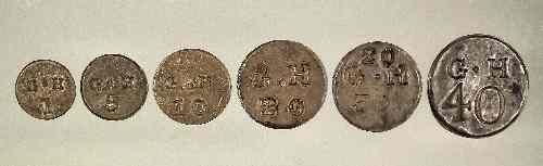 Appraisal: A collection of stamped copper ''Hop'' tokens initialled ''G H