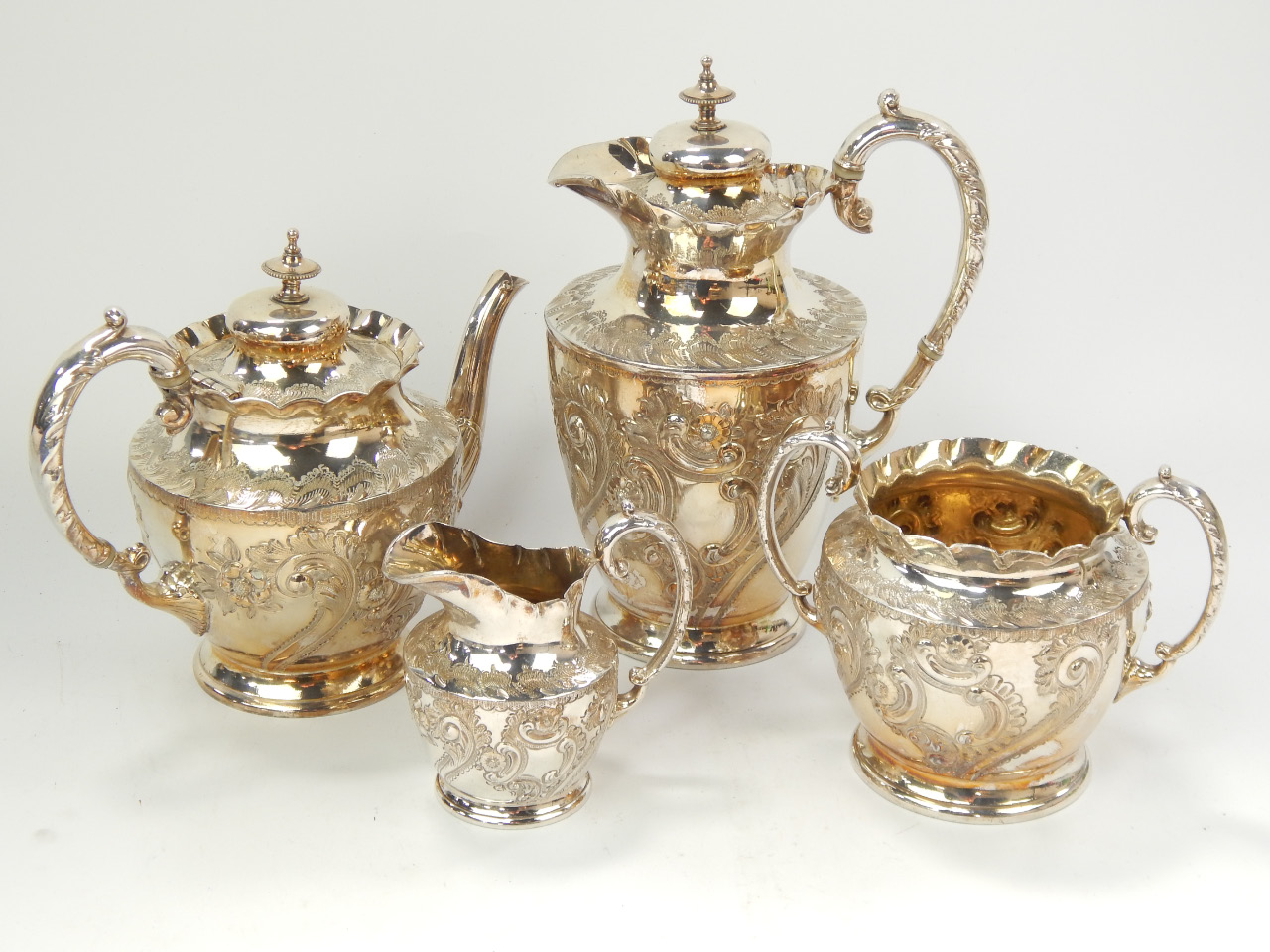 Appraisal: A late Victorian EPBM four piece teaset decorated with embossed