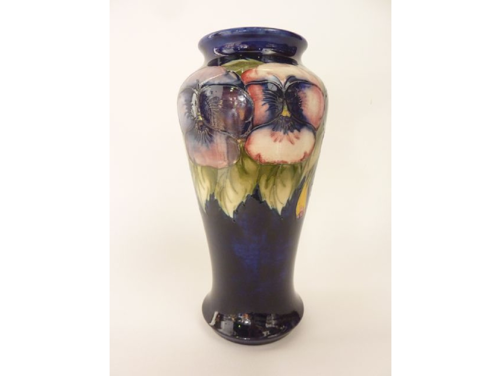 Appraisal: A Moorcroft blue ground vase of baluster shaped form with