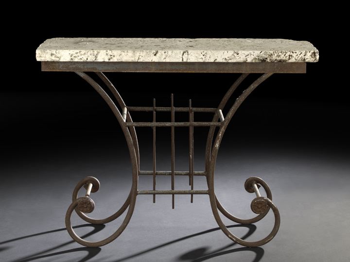 Appraisal: Neoclassical-Style Limestone and Wrought-Iron Table the rectangular limestone top raised