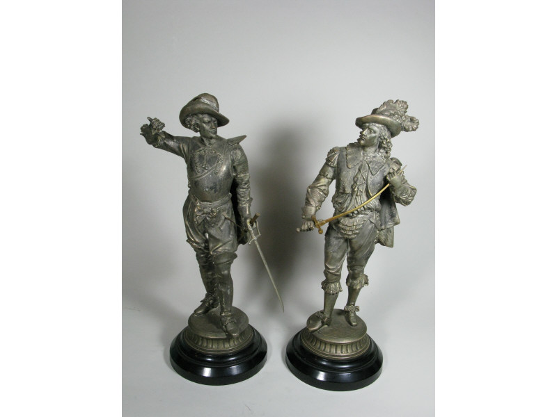 Appraisal: Pair of Spelter Cavaliers in th c attire on circular