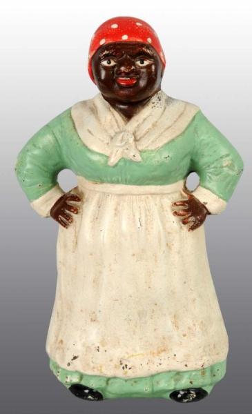 Appraisal: Large Cast Iron Mammy Doorstop Description Made by Hubley cat