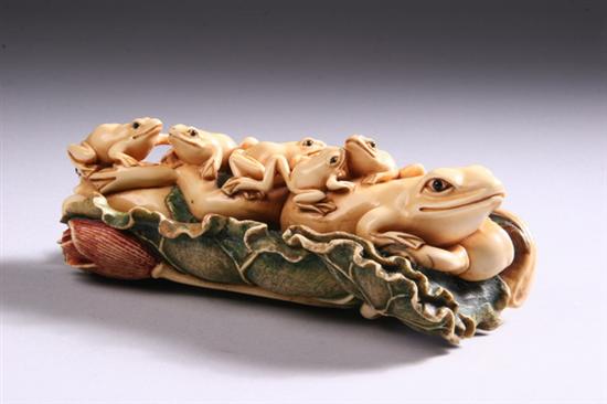 Appraisal: JAPANESE IVORY OKIMONO Carved to depict frogs on a leaf