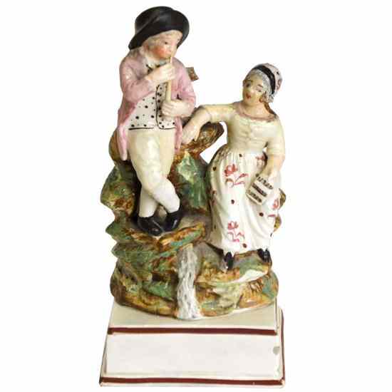 Appraisal: An English Staffordshire Pottery Figural Group circa depicting a couple