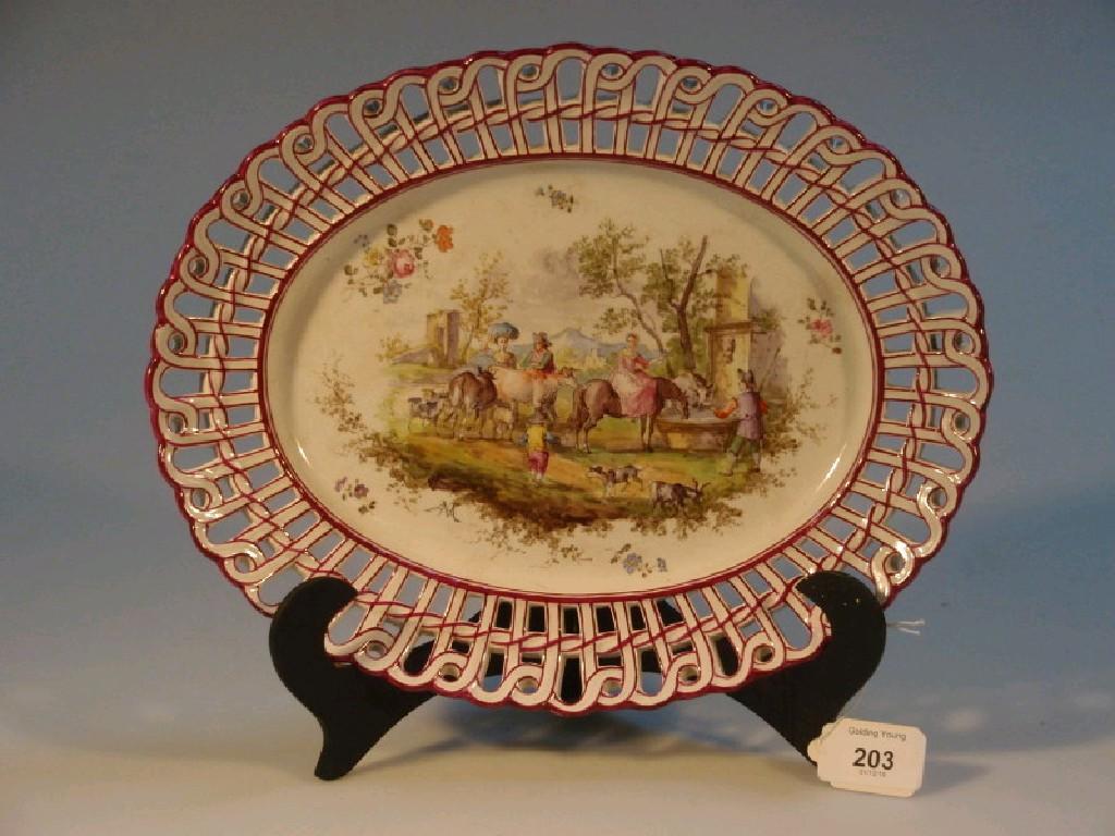 Appraisal: A thC Italian pottery oval plate painted to the well